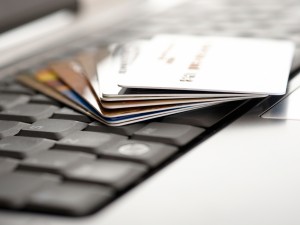 Credit cards and laptop. Shallow DOF